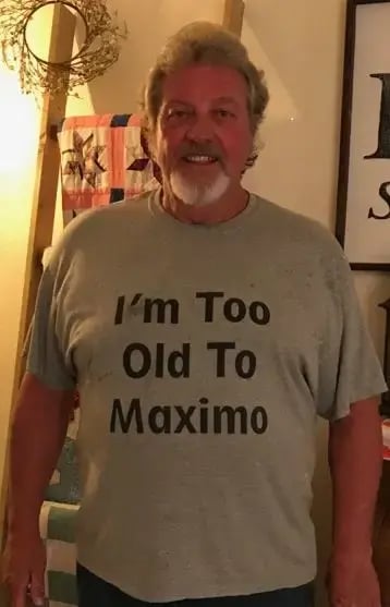 IPSC Employee Wearing "I'm too old to Maximo" shirt