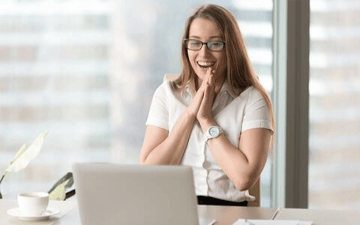 Office worker is excited about a more efficient planning and scheduling software 