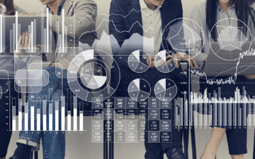 Pie charts digitally laid over businessmen 