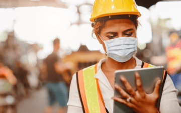 Maintenance planner looks over safety permits before a job 