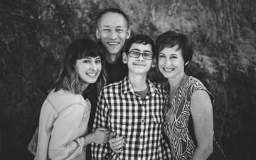 Cor stands with family 