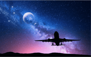 Airplane taking off with galaxy in the background 