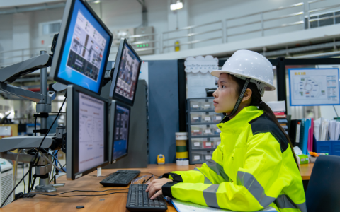 Maintenance worker reviewing master data in EAM system