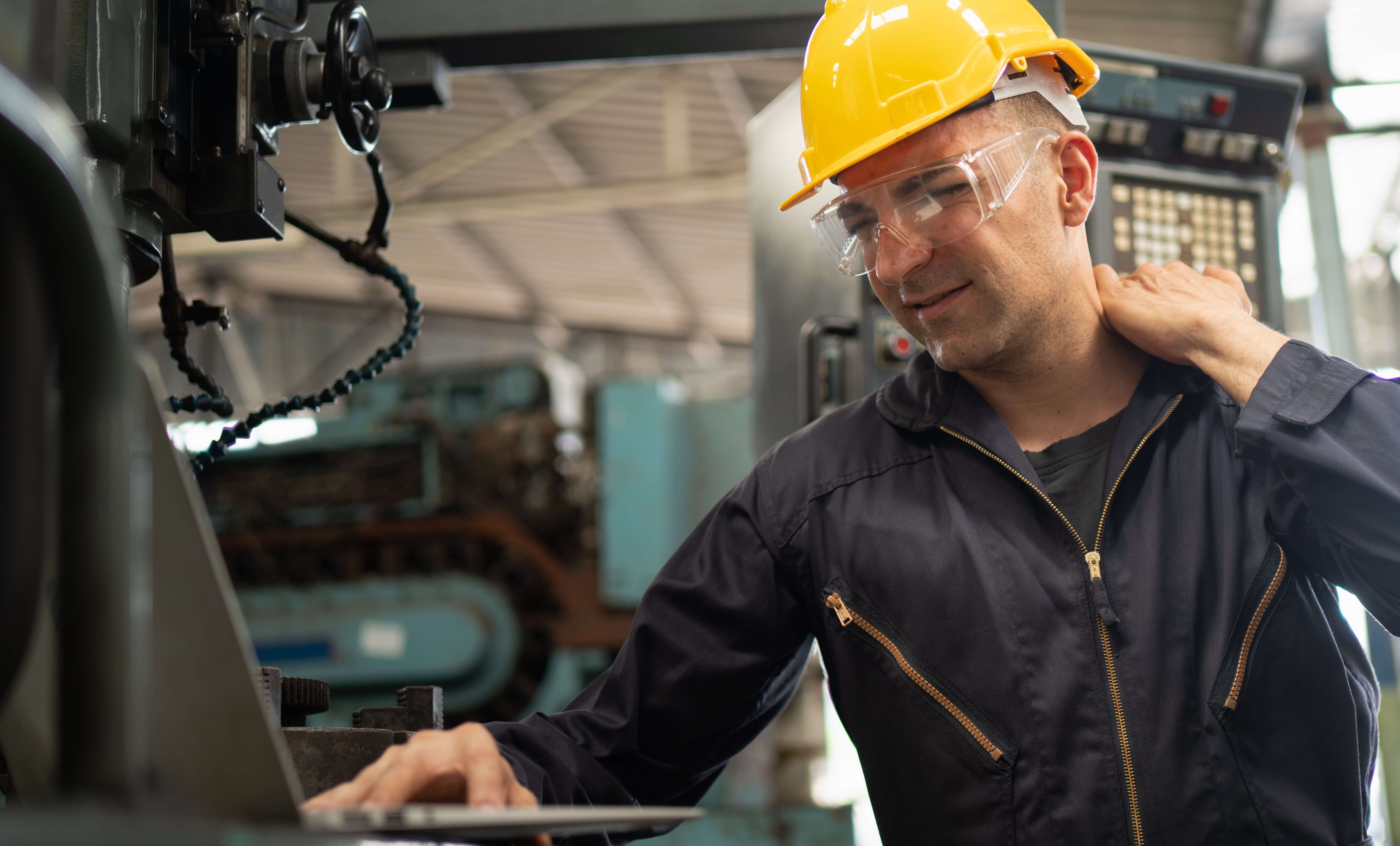 Technician looking at a machine