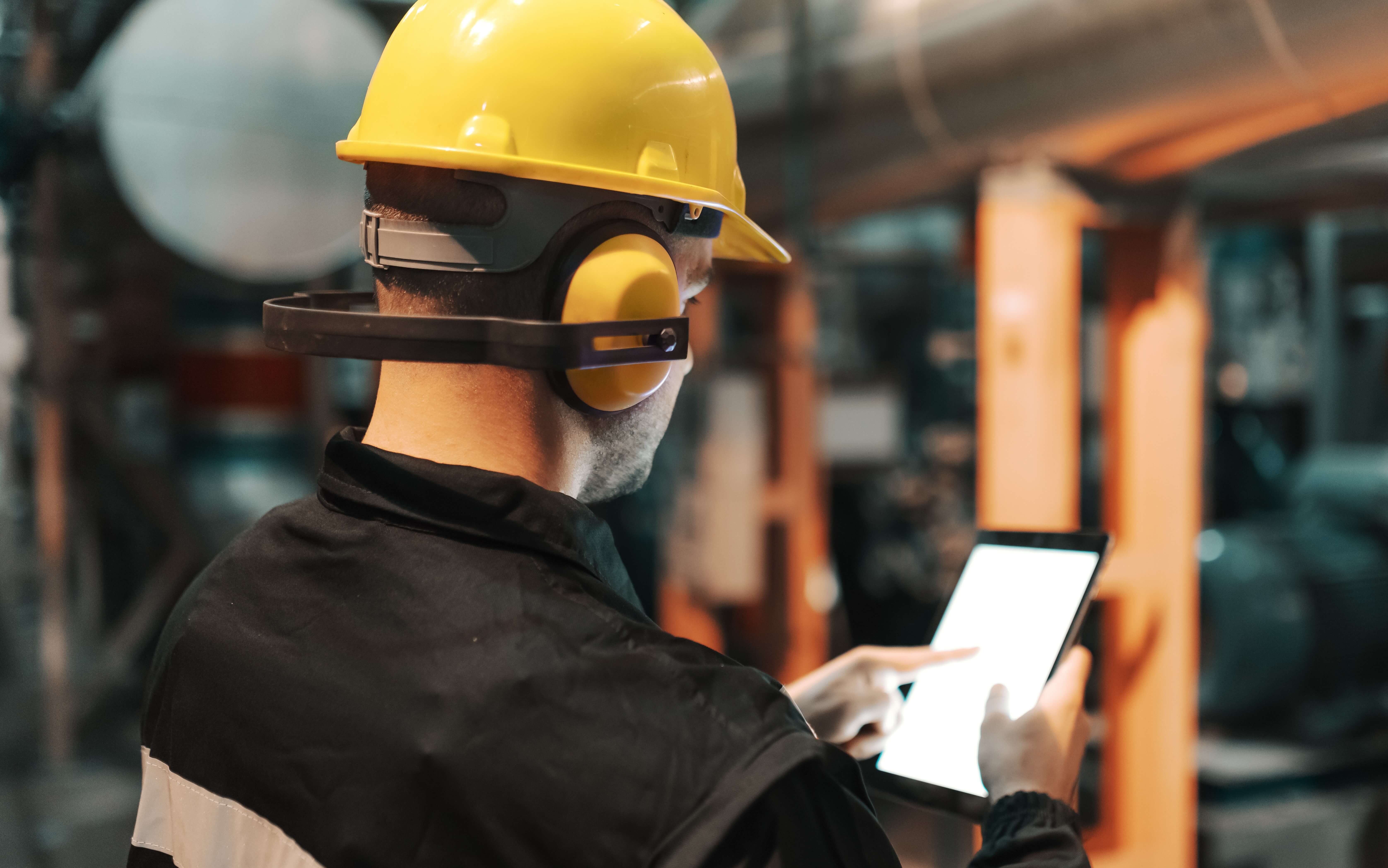 Technician editing information on a tablet